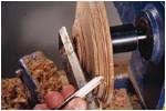 Round off the edges of the steps using very fine cuts with the point of a spindle gouge